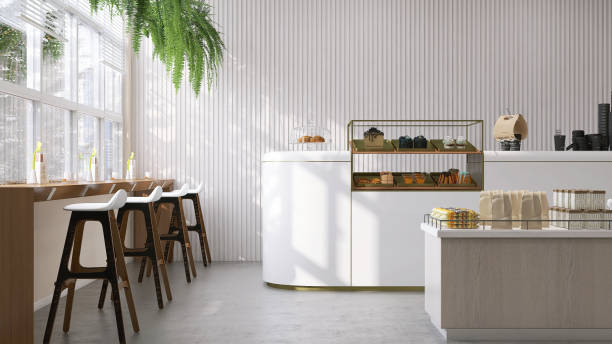 흰색 카운터, 케이크 디스플레이 냉장고, 바 높이 테이블 및 의자가 있는 현대적이고 고급스러운 카페 디자인 창문에서 햇빛이 비치는 - cafe culture 뉴스 사진 이미지