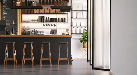 Modern and luxury cafe design with wooden top black counter, digital cash register, stool in sunlight from reeded glass folding door for interior and decoration