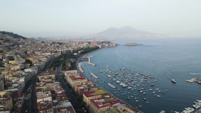 Aerial view of Naples downtown at sunset, Naples, Campania, Italy.