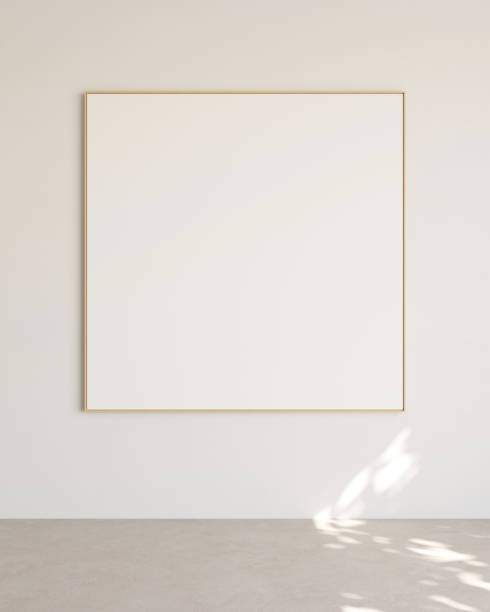 istock Computer graphic of empty white square notice board with wooden frame on white wall. Template for your content. 3D illustration. 1436367907