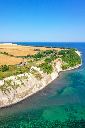Aerial view of Kap Arkona on Rügen island at the Baltic Sea with lighthouse and chalk cliffs portrait format travel in Germany
