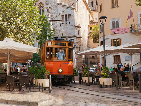 Sóller, Spain - October 18, 2022: The Tranvía de Sóller is a Spanish heritage tramway serving the town of Sóller and the coastal village of Port de Sóller, in the island of Majorca. It is owned by Ferrocarril de Sóller S.A. (FS), the same company operating the heritage rail line linking the town to the city of Palma