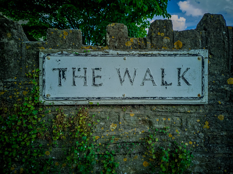 sign of road the walk