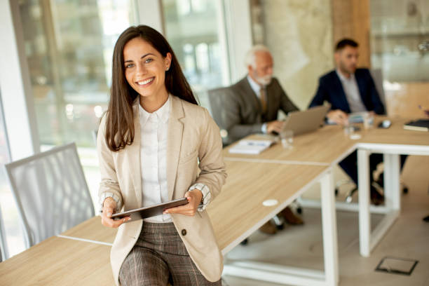 istock Young woman with digital tablet in the office 1436375891