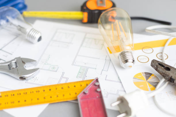 istock Computer Tablet Showing Kitchen Illustration Sitting On House Plans With Pencil. 1436376051