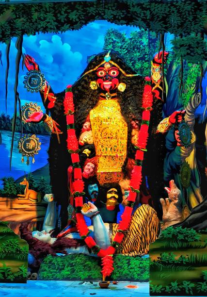 Kali is the form of the Mother Goddess Kali is the form of the Mother Goddess in which she appears angered and aroused to take on the torment of this world. The story of Kali, her origins, and purpose are best told in the 13 chapters of the Devi Mahatmyam, also known as Chandi Paat, and Durga Saptashati (“700 verses to Goddess Durga”) in the Markandeya Purana. kali statue stock pictures, royalty-free photos & images