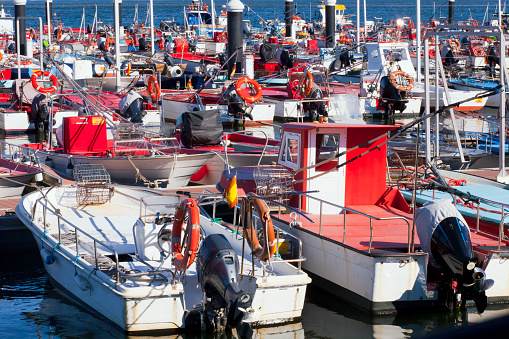 Fishing boats, Testal harbor , Noia, A Coruña  province, Galicia, Spain. Full frame view suitable for background purposes. Motor boats in the foreground.
