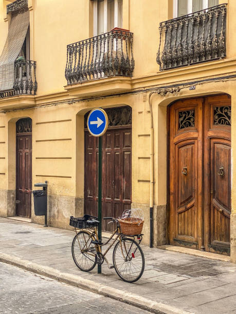istock Bicycle attached to road sign pole 1436379166