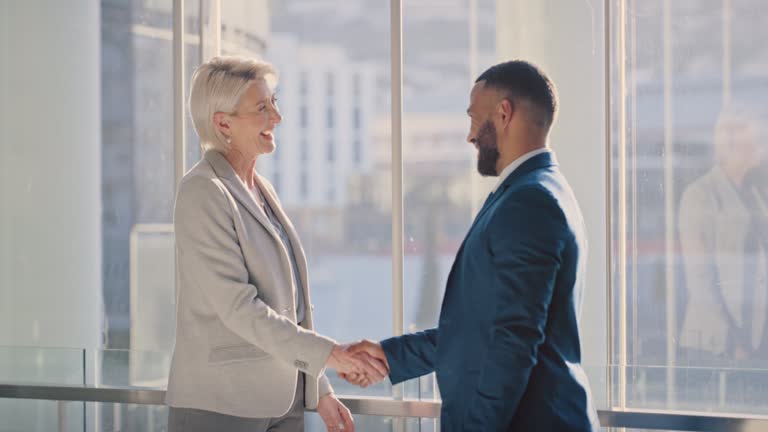 B2B, thank you or handshake business people shaking hands after success deal, welcome or hiring new corporate worker. Office worker happy in success partnership during job interview or recruitment