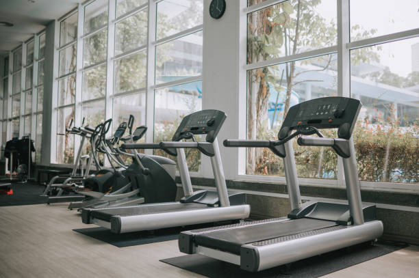 istock Gym Room with Treadmill and workout equipment 1436388482