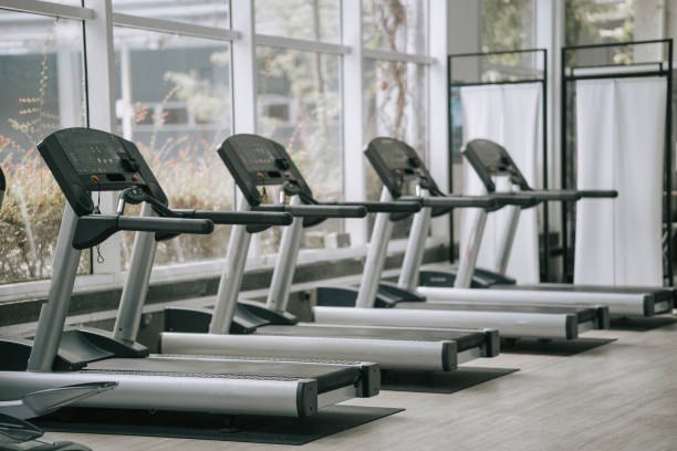 istock Gym Room with Treadmill and workout equipment 1436388486