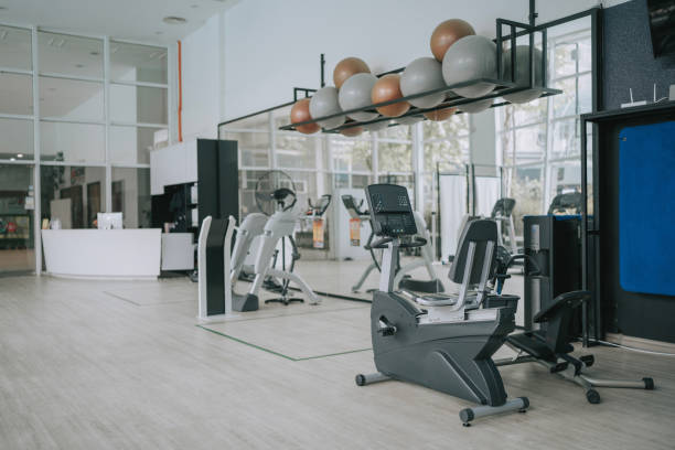 istock Gym Room with Treadmill and workout equipment 1436388495