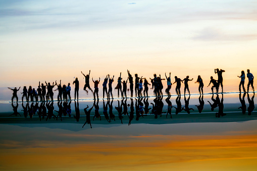 Unrecognizable Person Jumping at Sunset at Salt Lake in Turkey