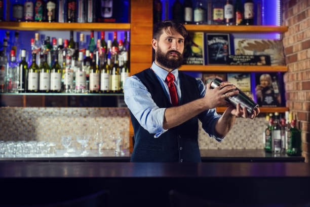 istock Barman preparing cocktail in night club 1436391039