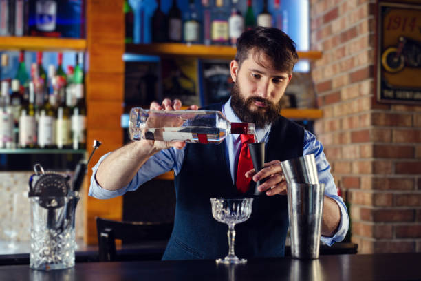 istock Barman preparing cocktail in night club 1436391065
