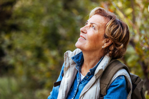 istock Adventurous Senior Woman Hiking in Forest 1436391176