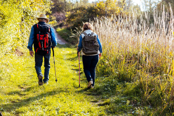 istock Senior couple hiking together 1436391797