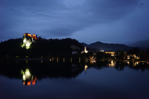 BLED lakeside night view, BLED castle and Cerkev Marijinega Vnebovzetja. Lake BLED is one of the top ten most beautiful lakes in the world, Slovenia