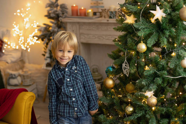 istock Cute child, boy, playing in a decorated room for Christmas 1436393572