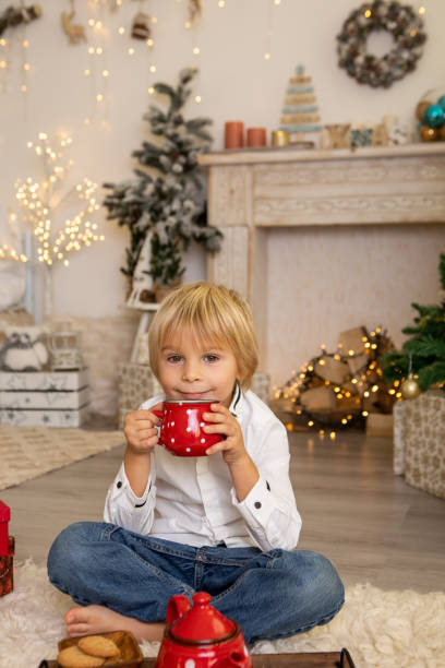 istock Cute child, boy, playing in a decorated room for Christmas 1436394479
