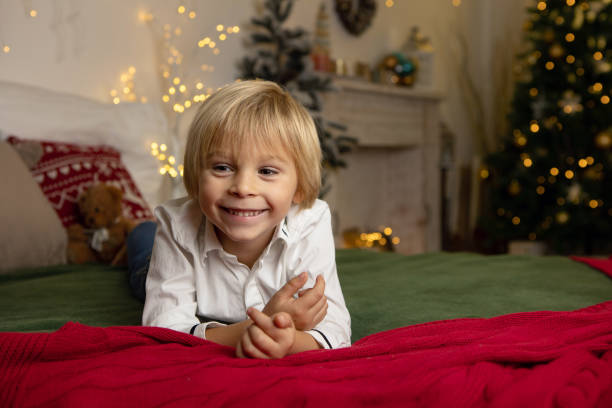 istock Cute child, boy, playing in a decorated room for Christmas 1436395336