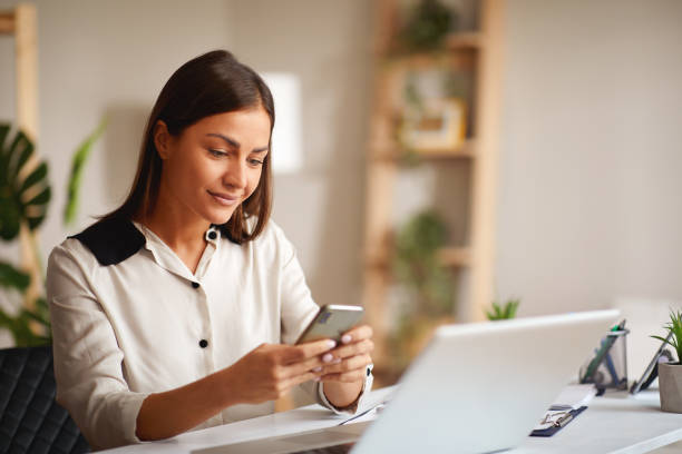 istock Beautiful young woman works from home 1436395502
