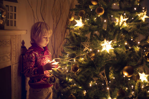 istock Cute child, boy, playing in a decorated room for Christmas 1436395651