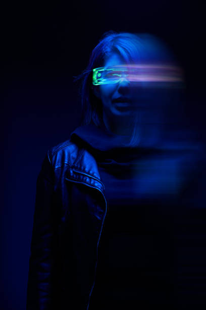istock Woman is using augmented reality headset. Concept of virtual, augmented and extended reality. 1436398602