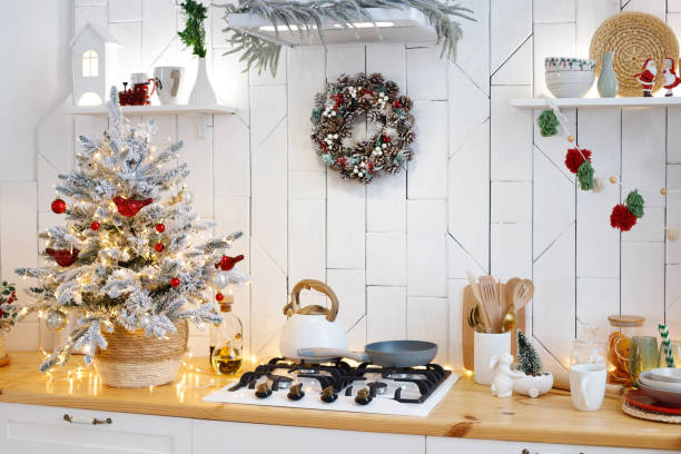 istock tree in the christmas kitchen at home. scandinavian style kitchen 1436402724