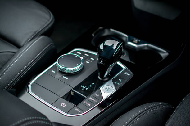 istock Detail on buttons controlling the windows in  car 1436405901