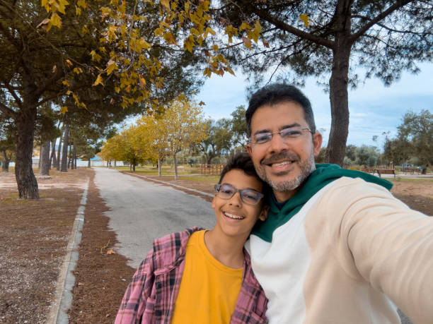 Father and son in the public park