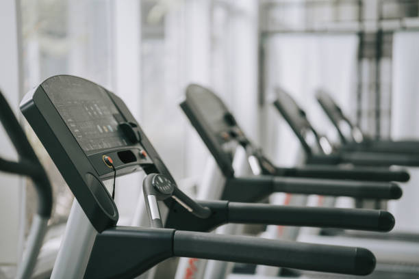 istock Gym Room with Treadmill and workout equipment 1436407546