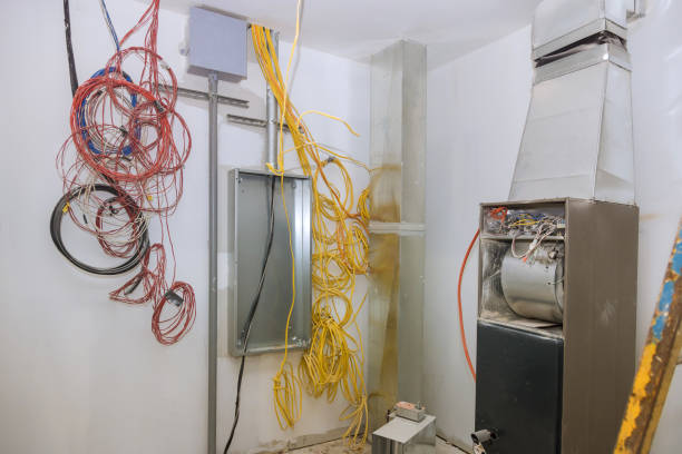 istock During the construction of the house under construction, an interior electric controls switches was connecting the power supply box 1436408184