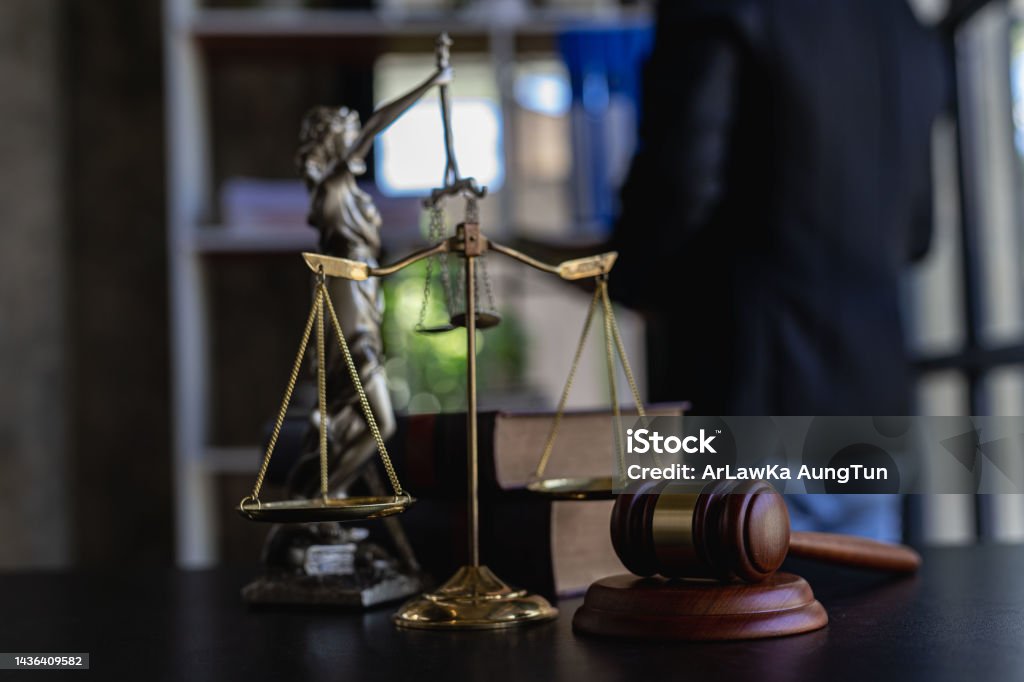Judge's hammer, scales, god of justice Law in the Lawyer's Office Disability Stock Photo