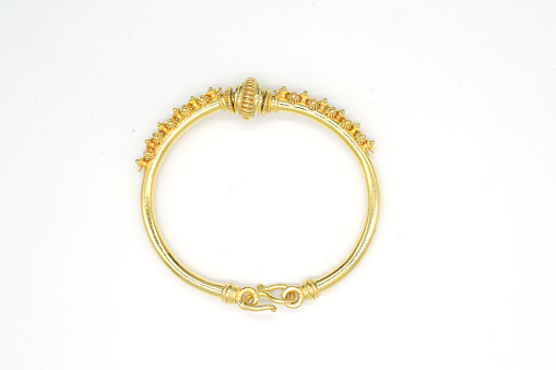 gold bangle isolated on white background