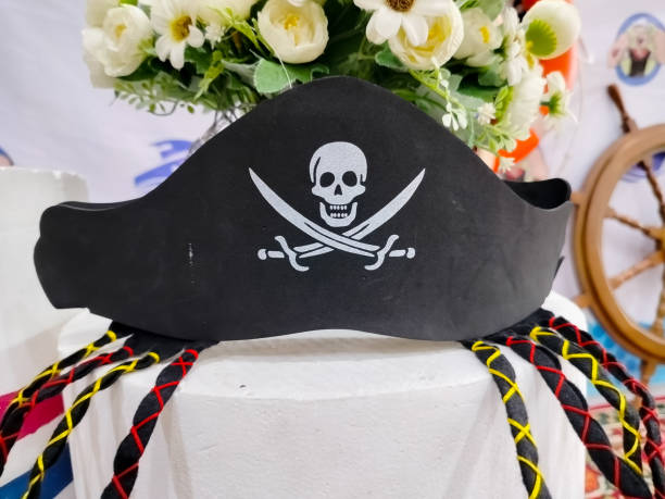 istock Pirate tricorn hat with skulls and a red bandana 1436413142