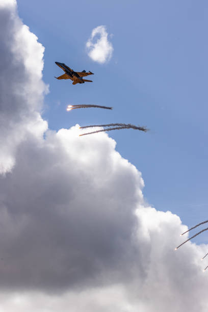 istock F/A18 jet fighter flying in the mountain 1436413399