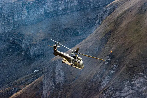 Eurocopter super puma flying in Alps