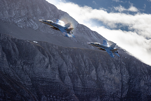 Military fighter jet plane at air base. Airport and airfield. Air force flight operation. Aviation and aircraft. Air defense. Military industry. Fly and flying. Dogfight and afterburner.