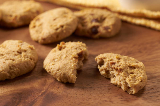 istock Oatmeal cookies with chocolate chips on wood background 1436416120