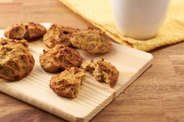 istock Oatmeal cookies with chocolate chips on wood background 1436416391