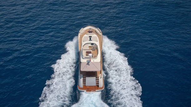 istock Modern yacht cruising in sea 1436420000