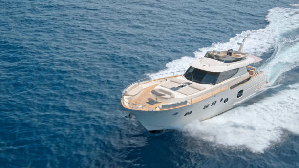 istock Modern yacht cruising in sea 1436420012