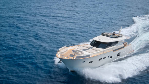 istock Modern yacht cruising in sea 1436420017