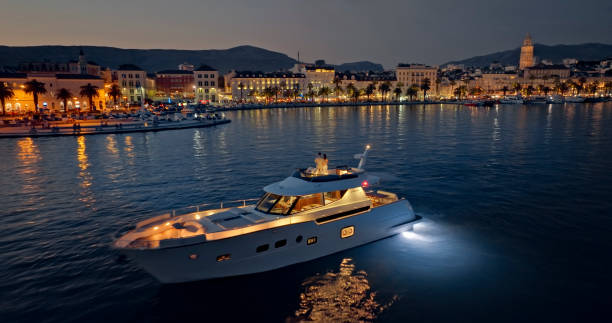 Couple standing on luxury yacht in Adriatic sea, Split, Croatia.