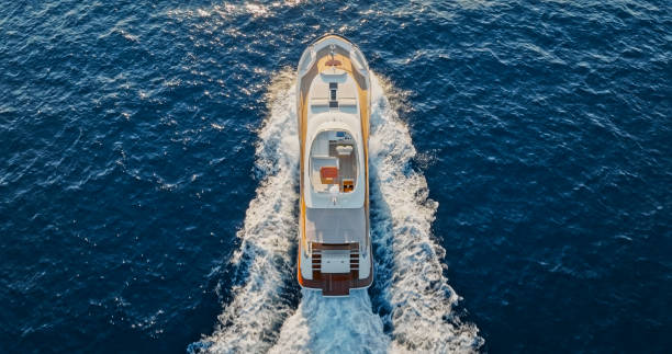 istock Modern yacht cruising in sea 1436420059