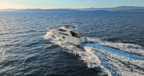 istock Modern yacht cruising in sea 1436420066