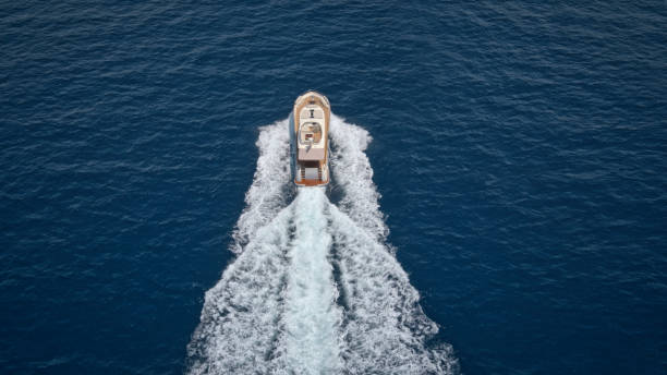 istock Modern yacht cruising in sea 1436420068