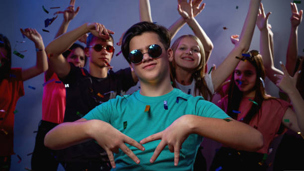 istock Joyful guy with friends dancing and having fun 1436422215