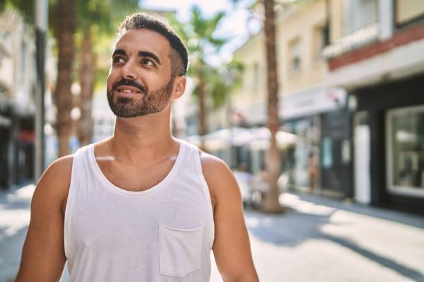 istock Hispanic sports man wearing workout style outdoors on a sunny day 1436423590